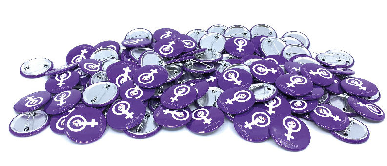 women strike badge